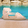 Ecru canvas butterfly flat espadrilles.