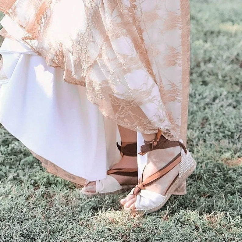 Butterfly espadrilles with double ribbons.