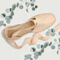 Flat espadrilles with lace ribbons